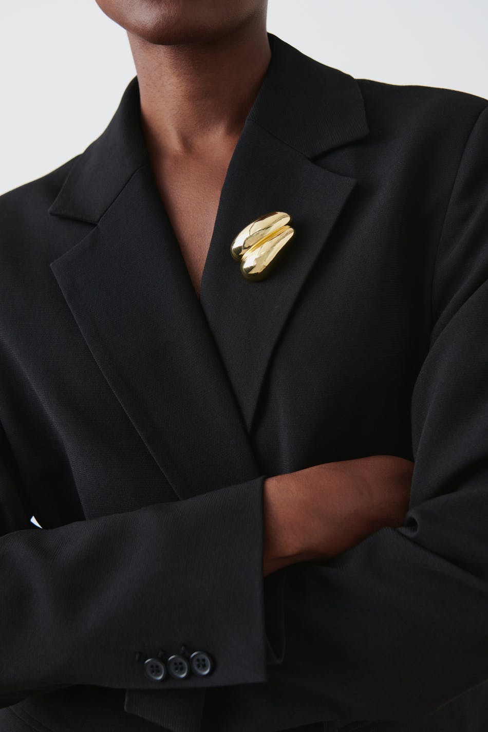 Uneven brooch