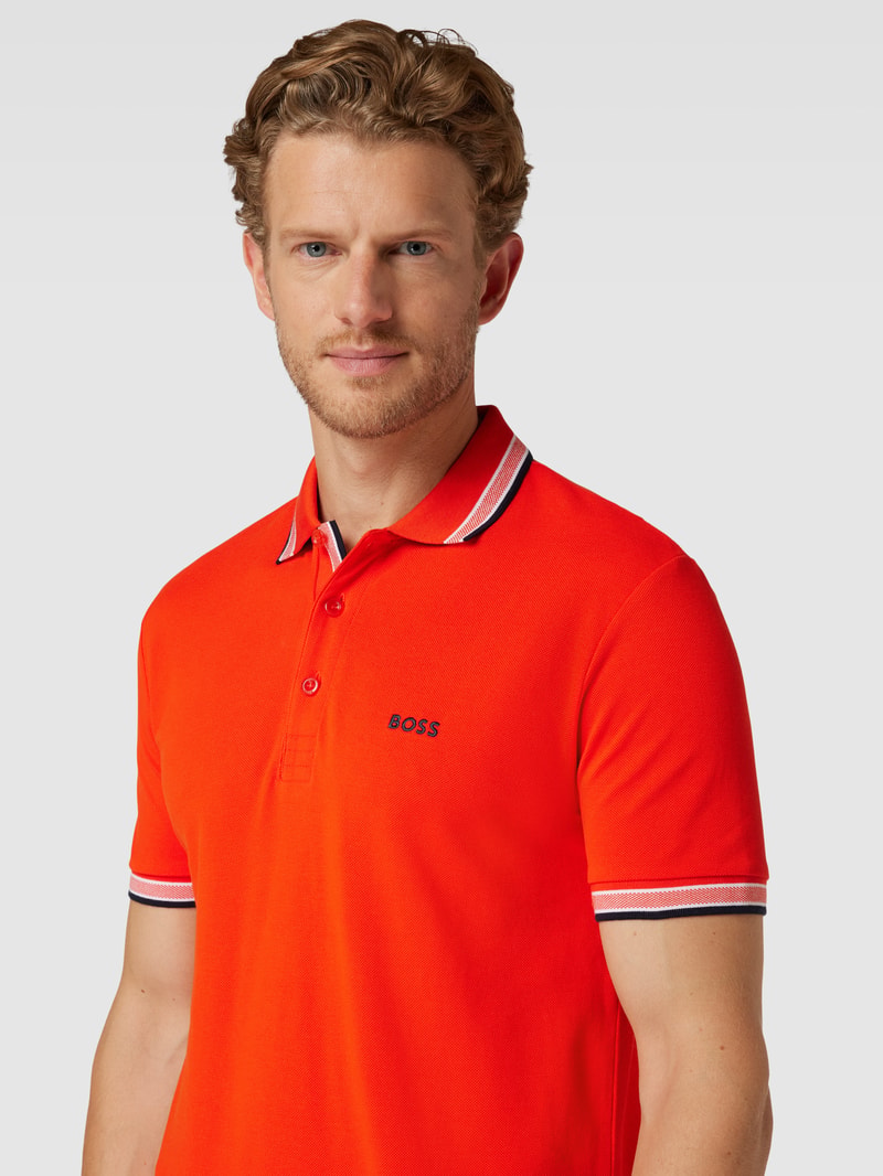 Poloshirt mit Label-Stitching Modell 'PADDY' in koralle