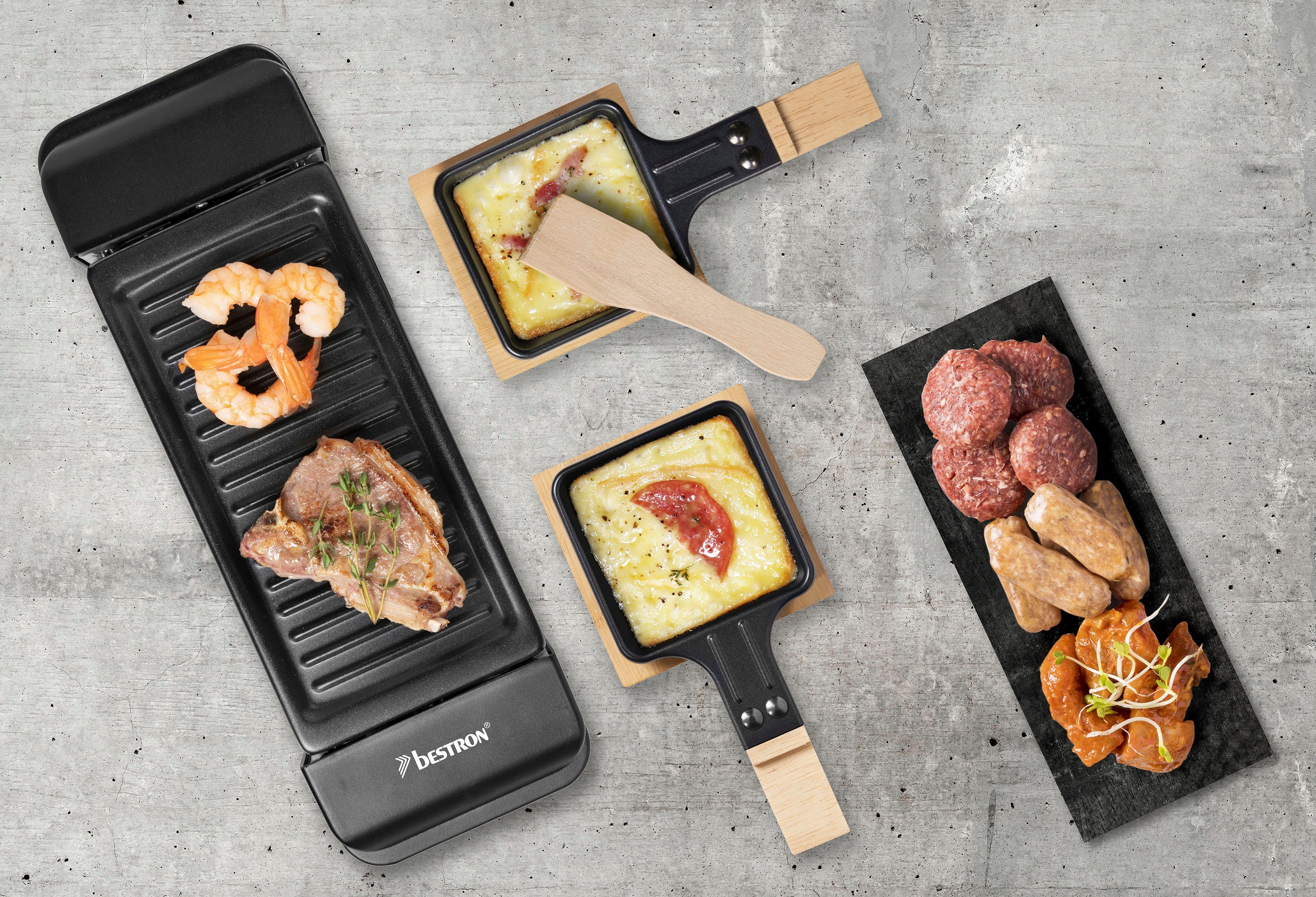 bestron Raclette Mini Tischgrill, 2 Raclettepfännchen, 350 W, für 1 bis 2 Personen, mit zwei Holzschabern & zwei Untersetzern