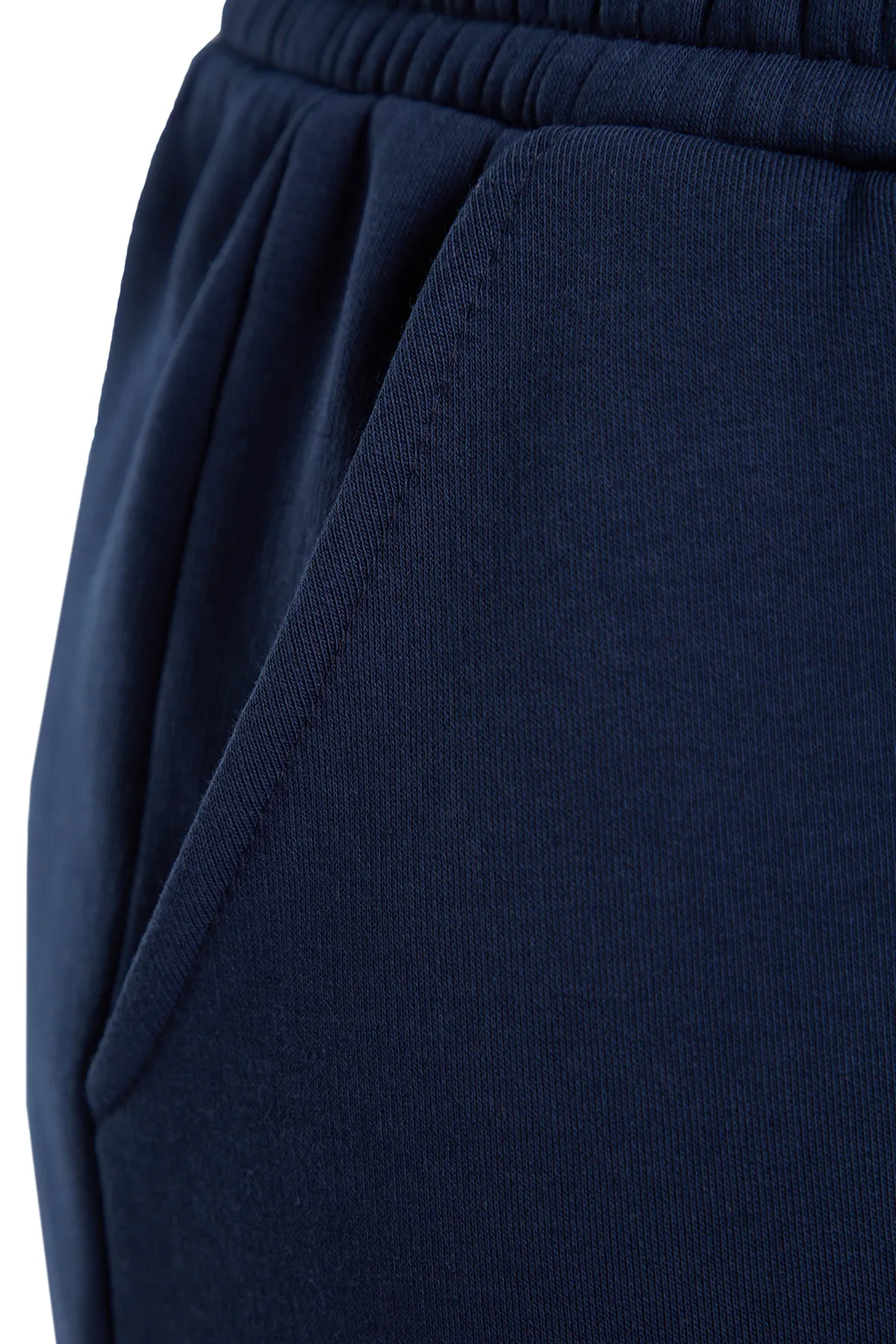 Trendyol Curve  Marineblaue Jogginghose aus dickem Fleece-Strick TBBAW24AJ00002