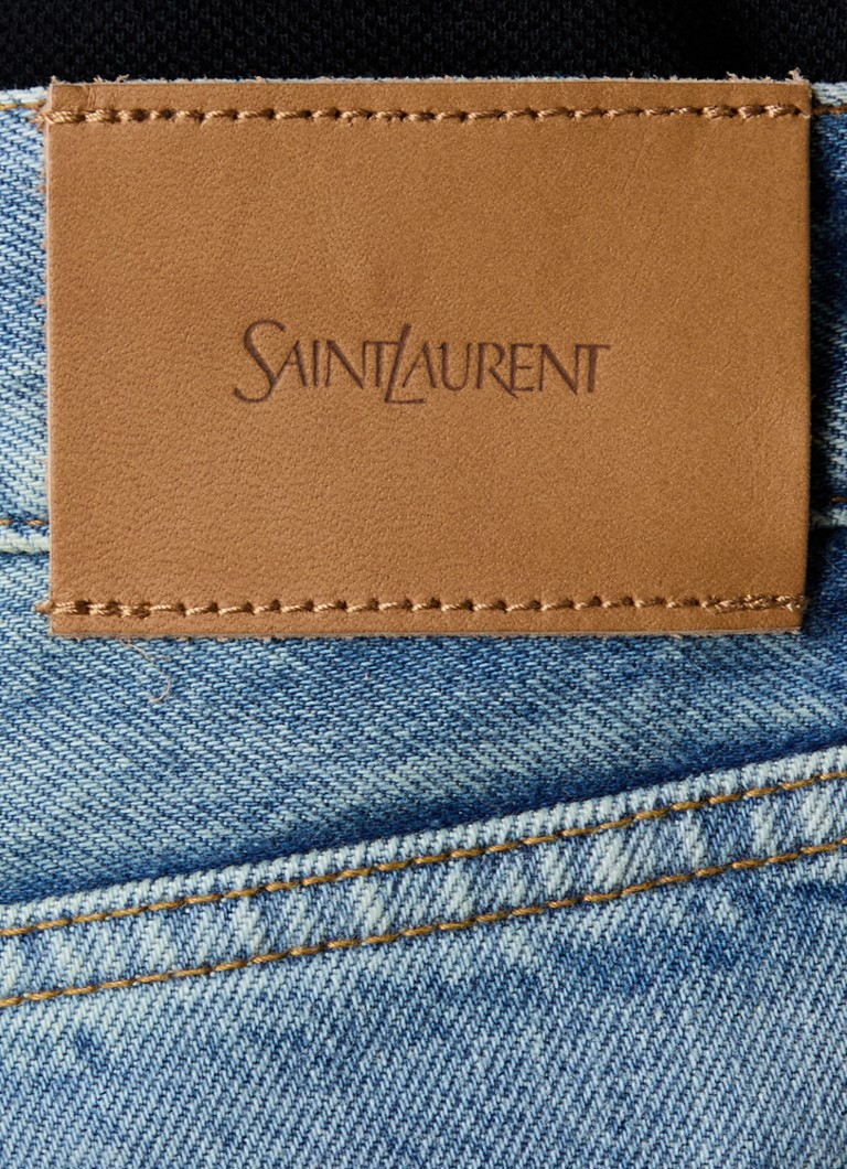 Jeansy Saint Laurent z prostymi nogawkami, lekko wyblakłe.