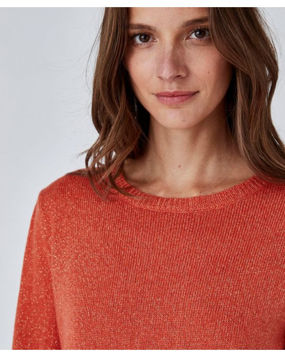 Pull brillant manches ballon.