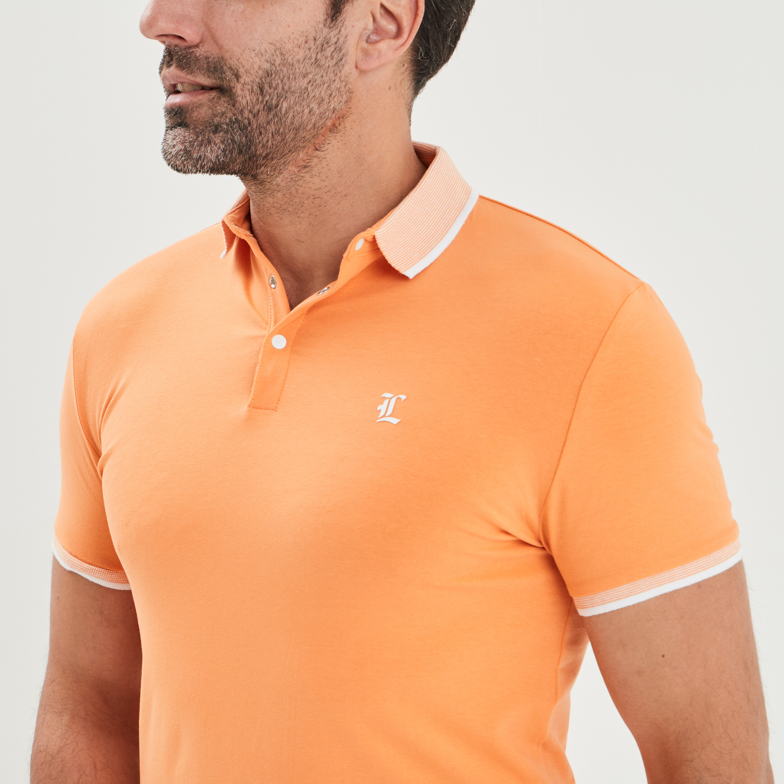 Polo ajusté manches courtes orange clair homme | La Halle