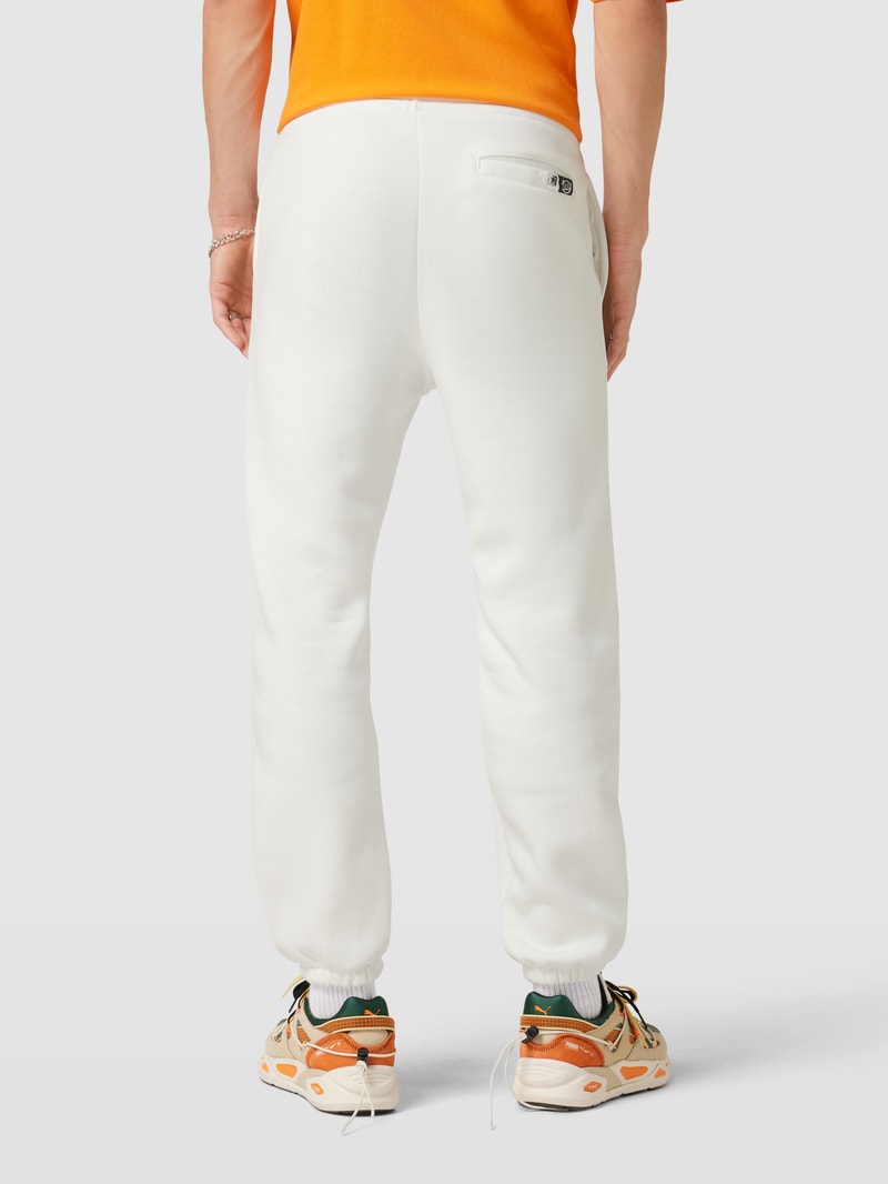 Sweatpants mit Label-Print in offwhite