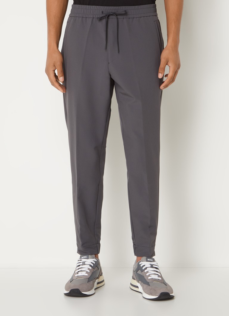 Pantaloni de trening HUGO BOSS T_Flex cu croială slim și buzunare laterale.