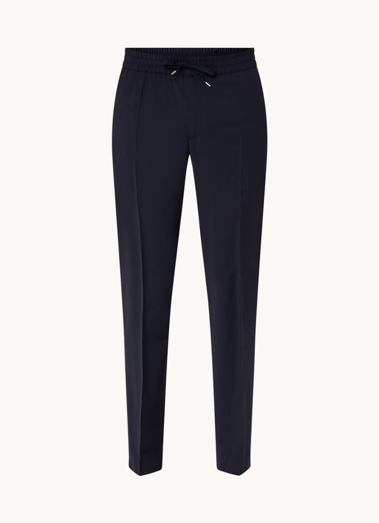 Pantaloni chino Sandro din amestec de lână, cu croială mulată și buzunare laterale.