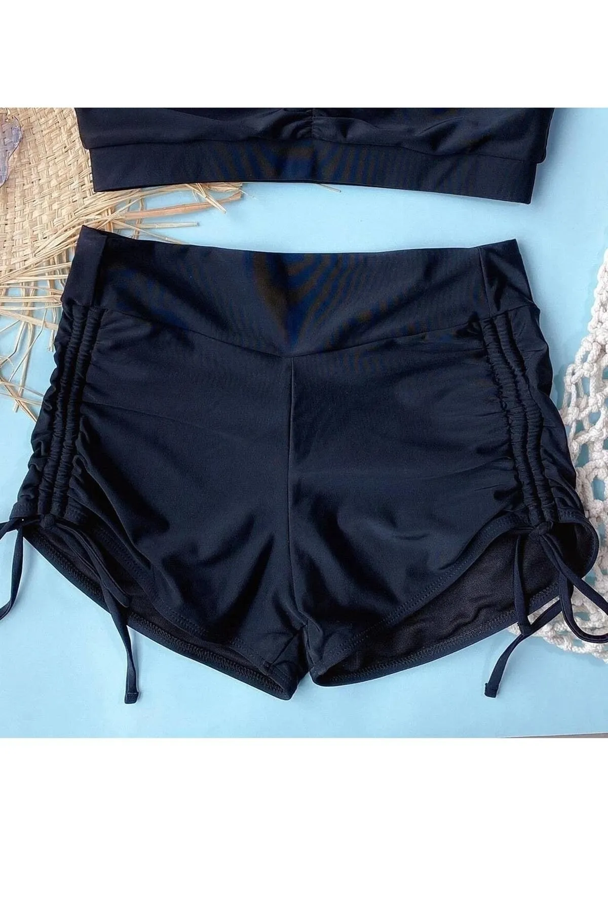 Angelsin  Seitlich verstellbare Badeshorts mit Kordelzug