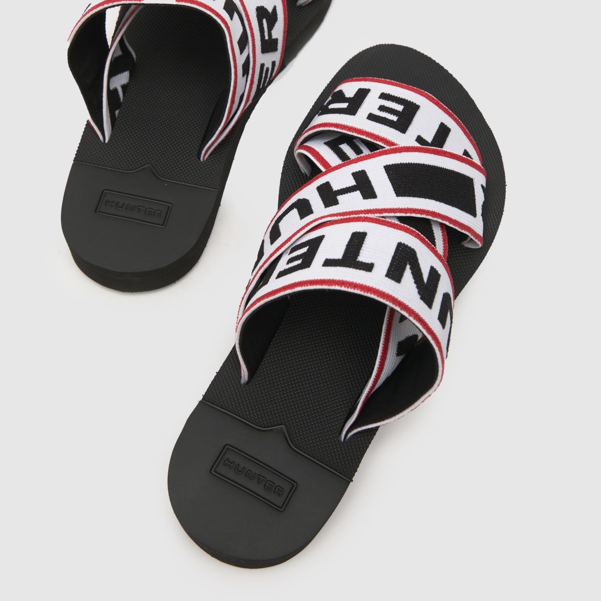 Sandály s logem HUNTER BOOTS v černé a červené barvě
