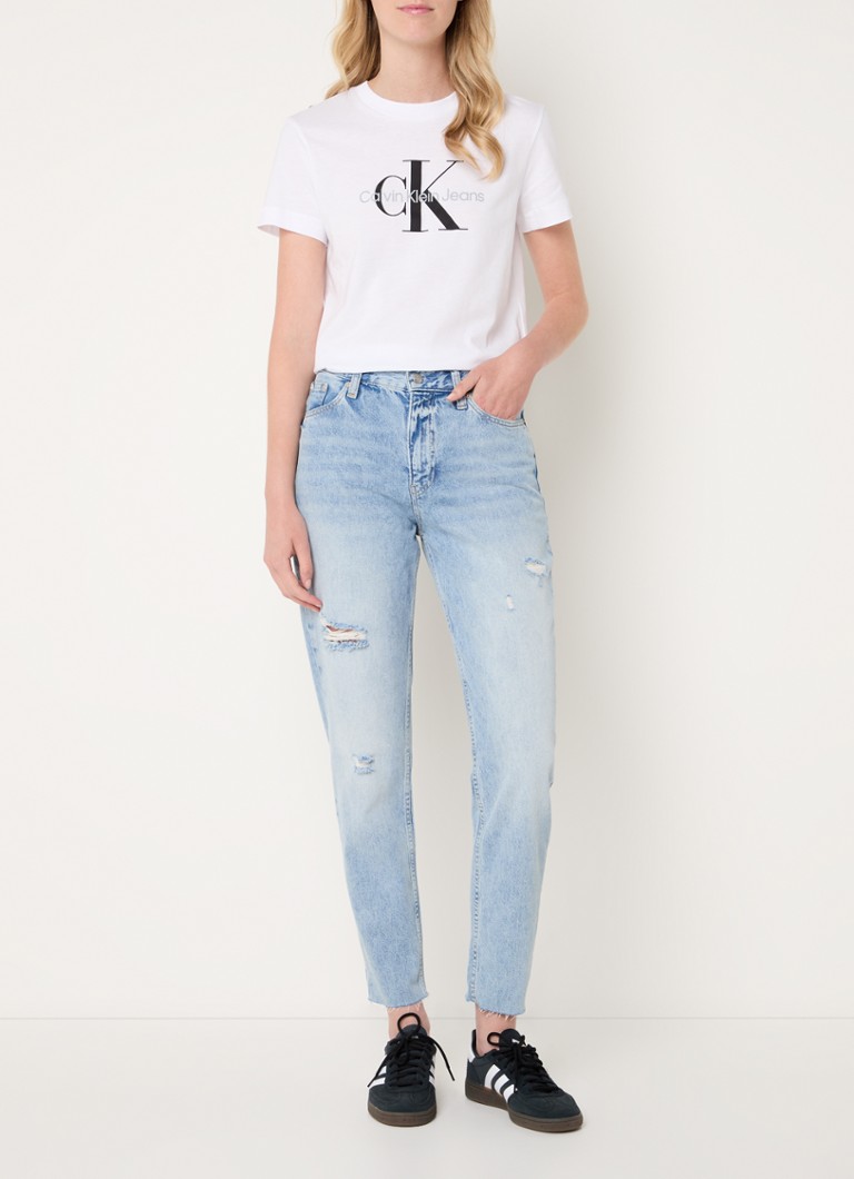 Jeans mom fit a vita alta di Calvin Klein, lavaggio chiaro e finitura effetto invecchiato.