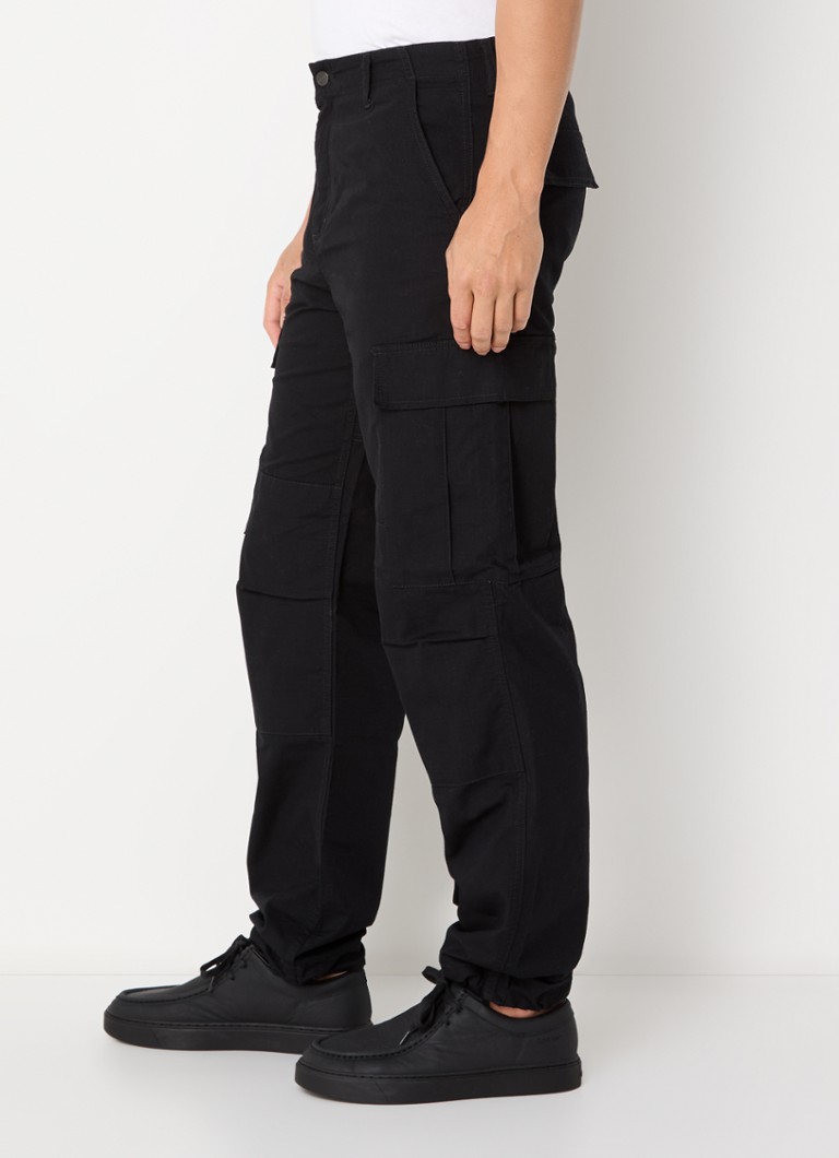 Carhartt WIP sašaurinātas piegriezuma kravas bikses ar uzšūtām kabatām