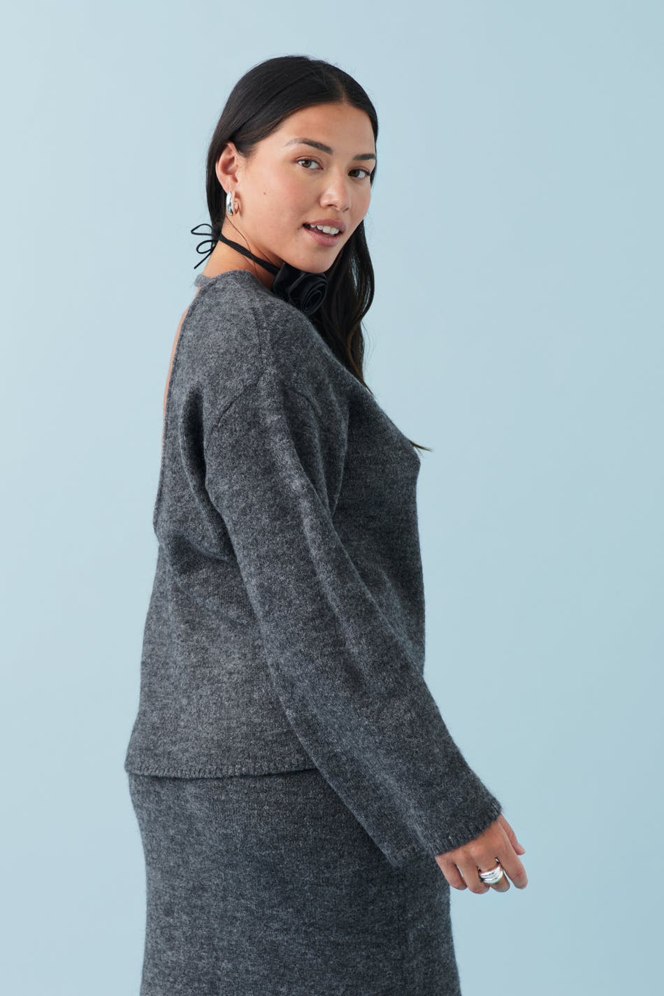 Open back knitted sweater
