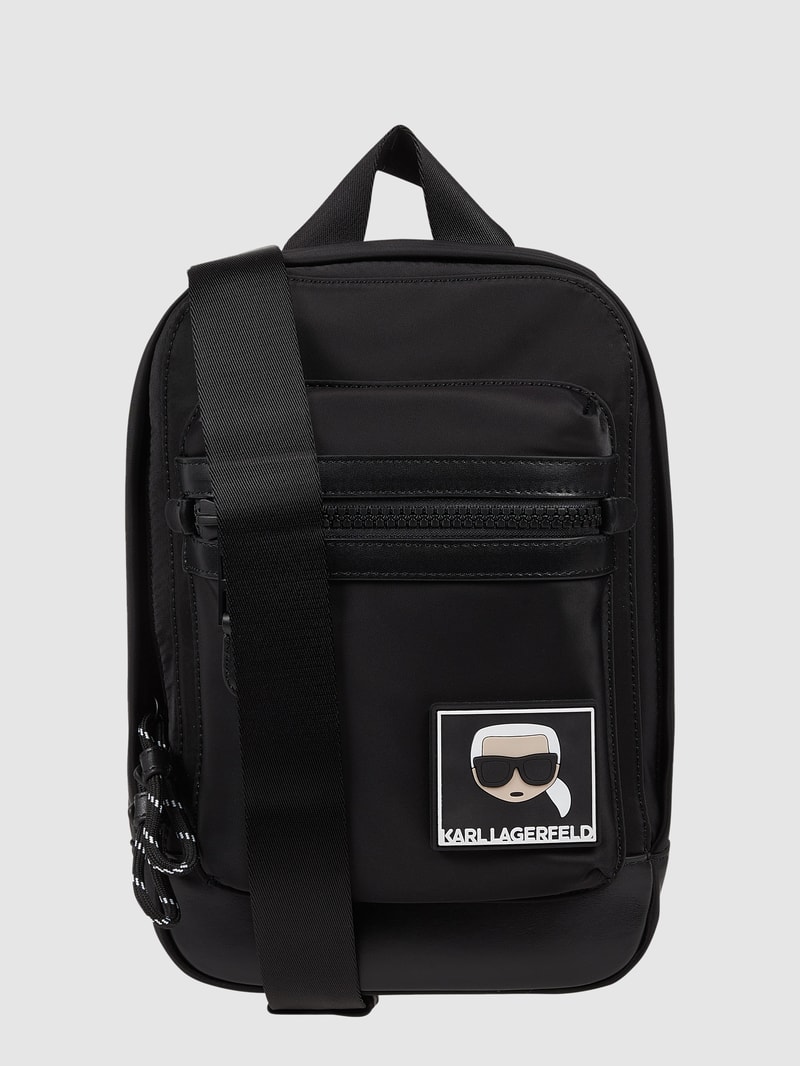 Umhängetasche mit Leder-Anteil in schwarz