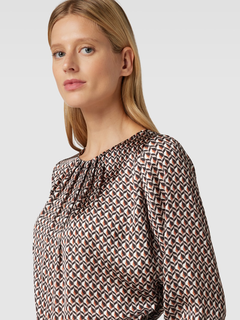 Bluse mit Allover-Muster in schwarz