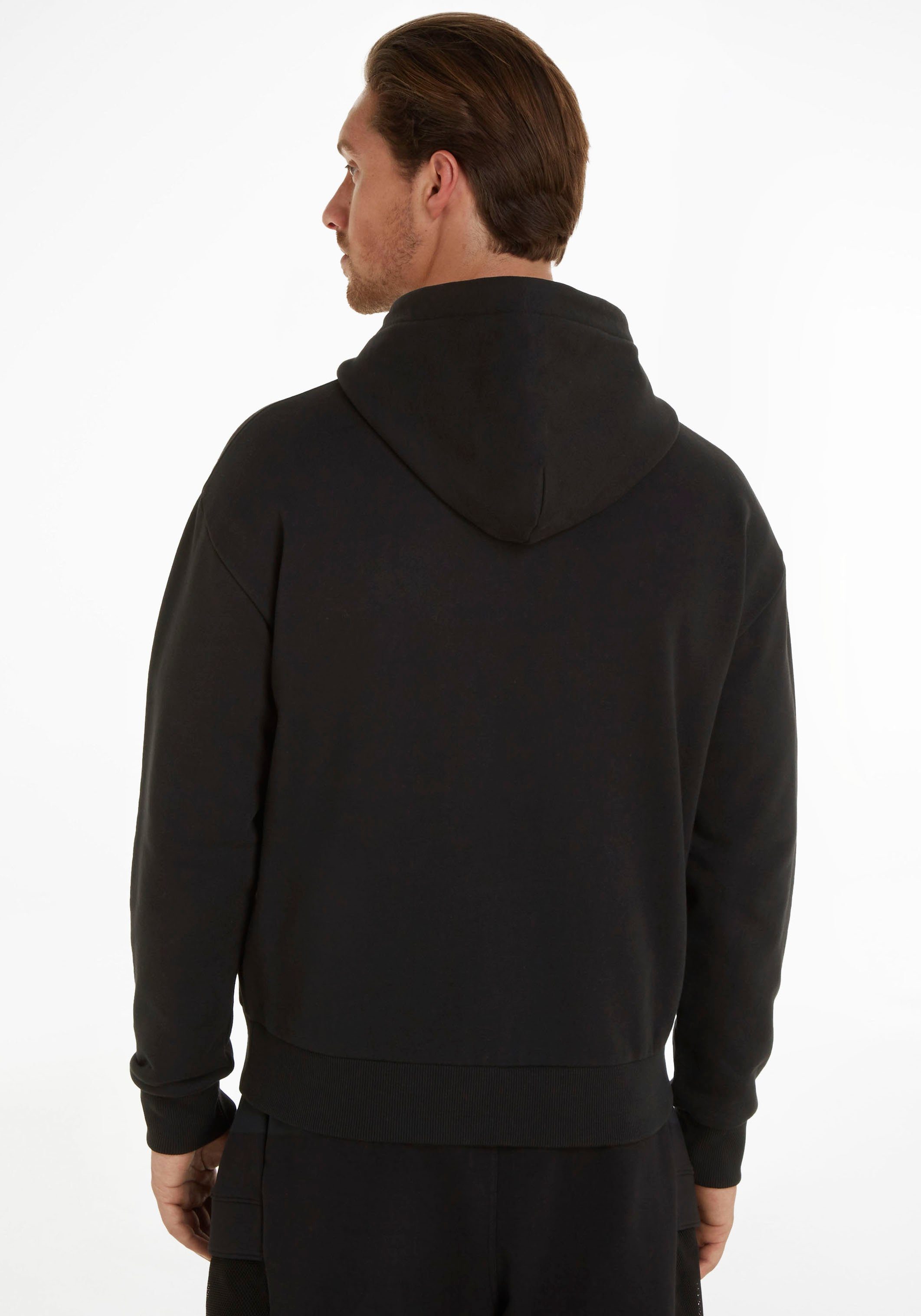 Calvin Klein Kapuzensweatshirt mit aufgenähtem CK-Badge auf der Brust