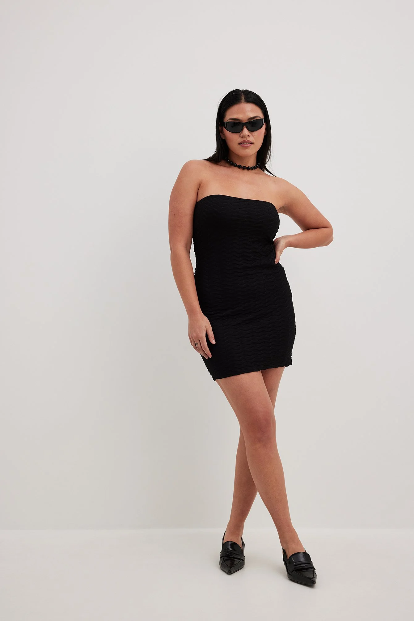 Strukturiertes Röhrenkleid
