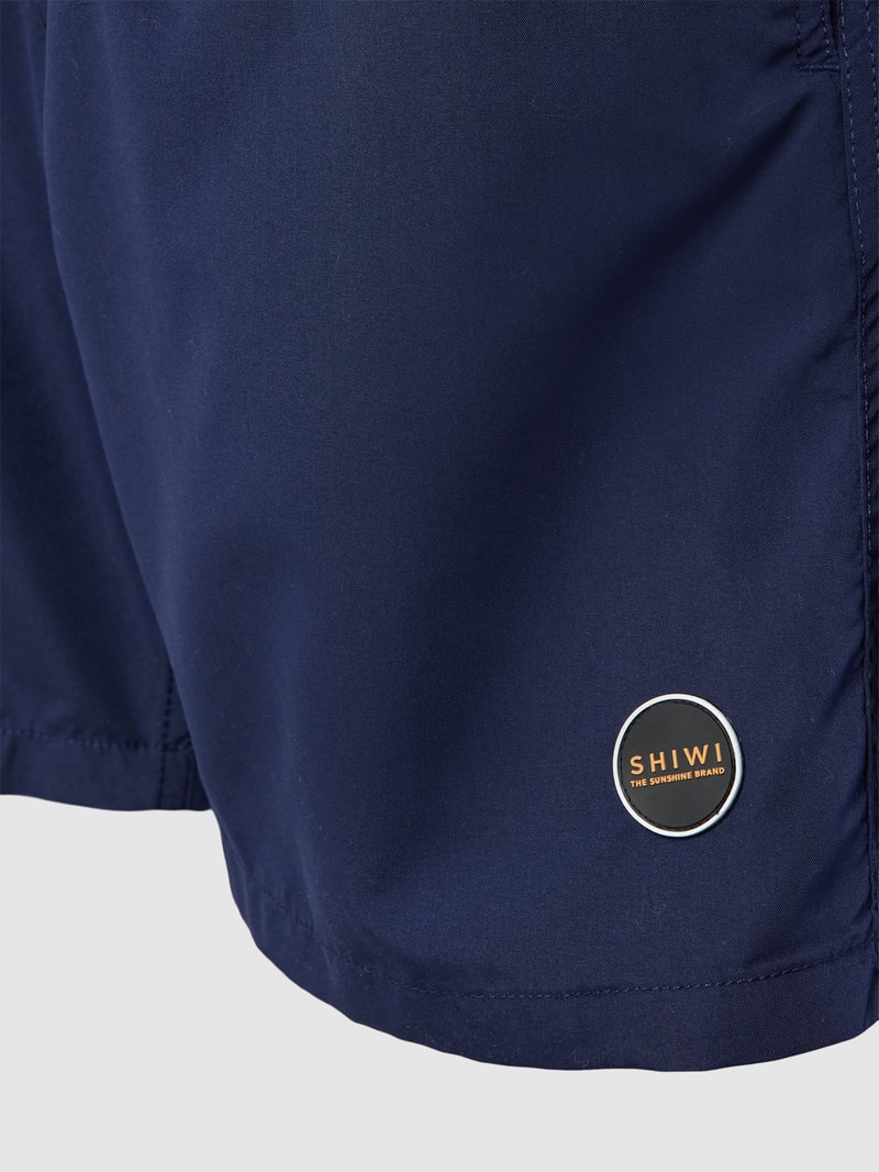 Badehose mit Label-Patch in dunkelblau