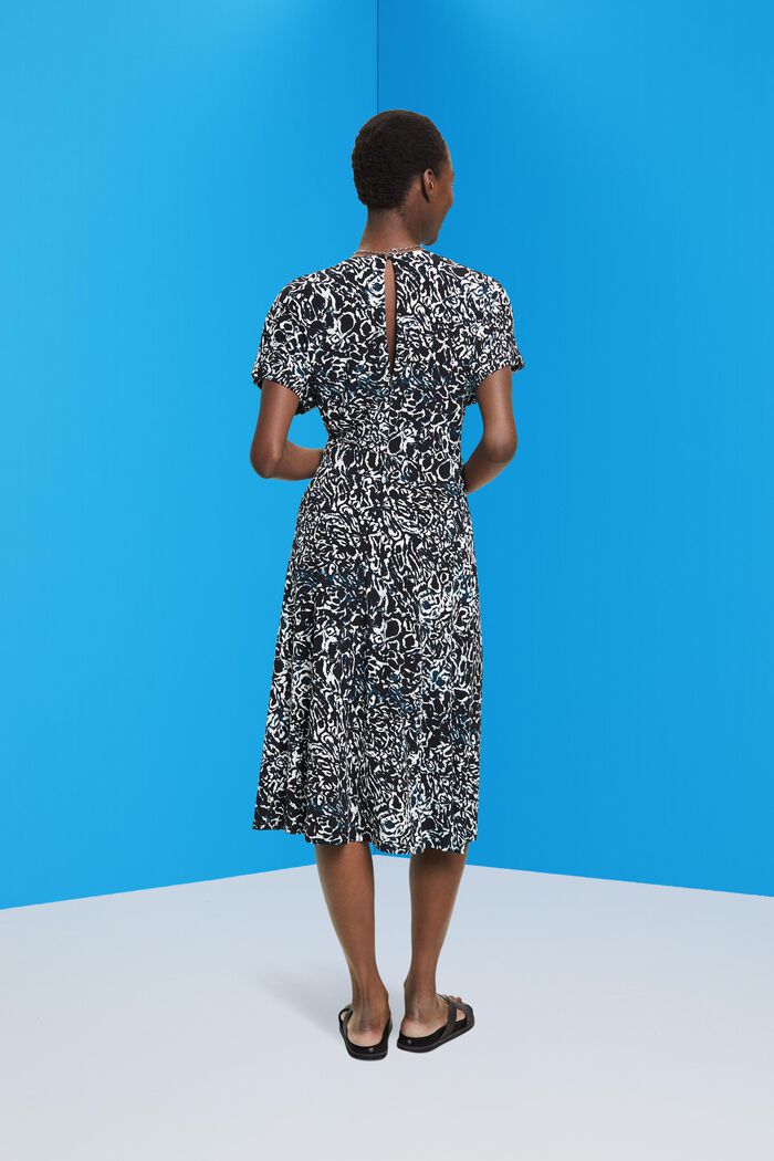 Jerseykleid mit V-Ausschnitt und Allover-Print