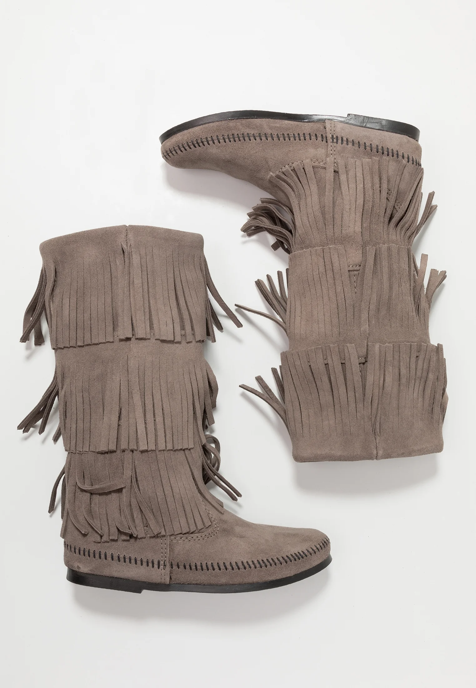 Botas altas Minnetonka de 3 capas con flecos