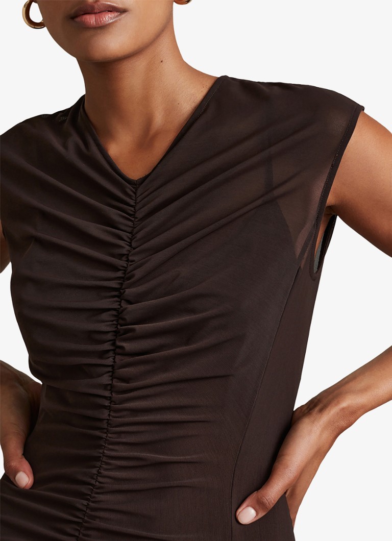 Robe midi Lyra de Reiss, ornée de volants et d'un ourlet asymétrique.