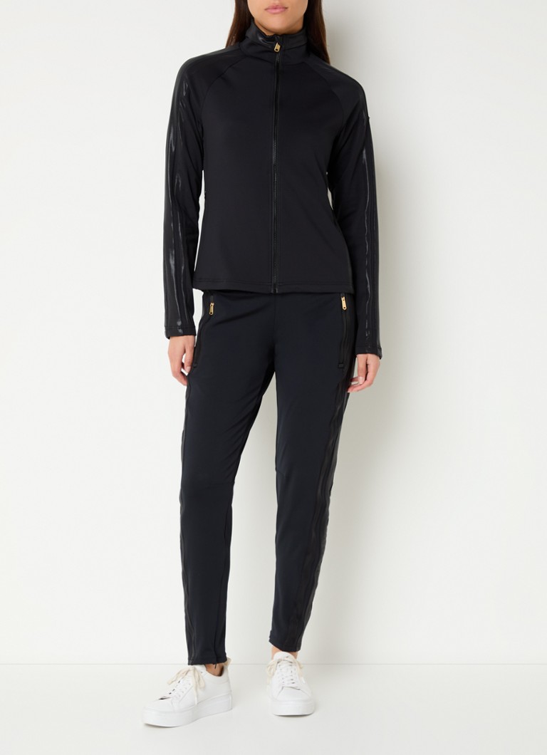 Pantalonii de trening Goldbergh Flux au o croială slim, talie înaltă și buzunare cu fermoar.