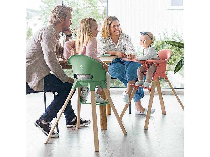 Chaise haute Stokke Clikk gris et sac de transport