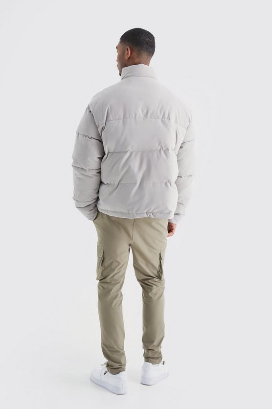Tall kastige Oversize Nylon-Steppjacke mit PU-Aufnäher