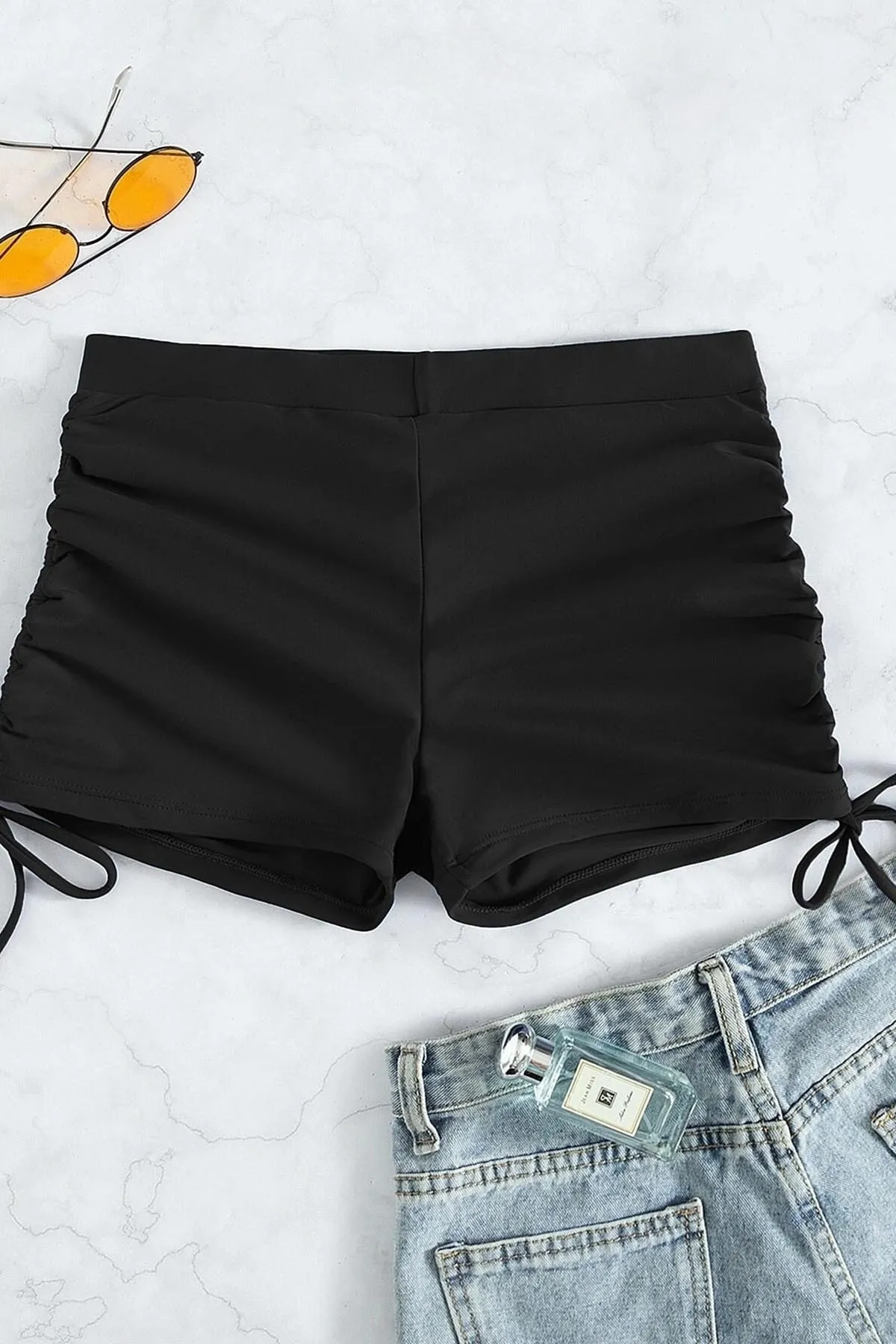Angelsin  Seitlich verstellbare Badeshorts mit Kordelzug