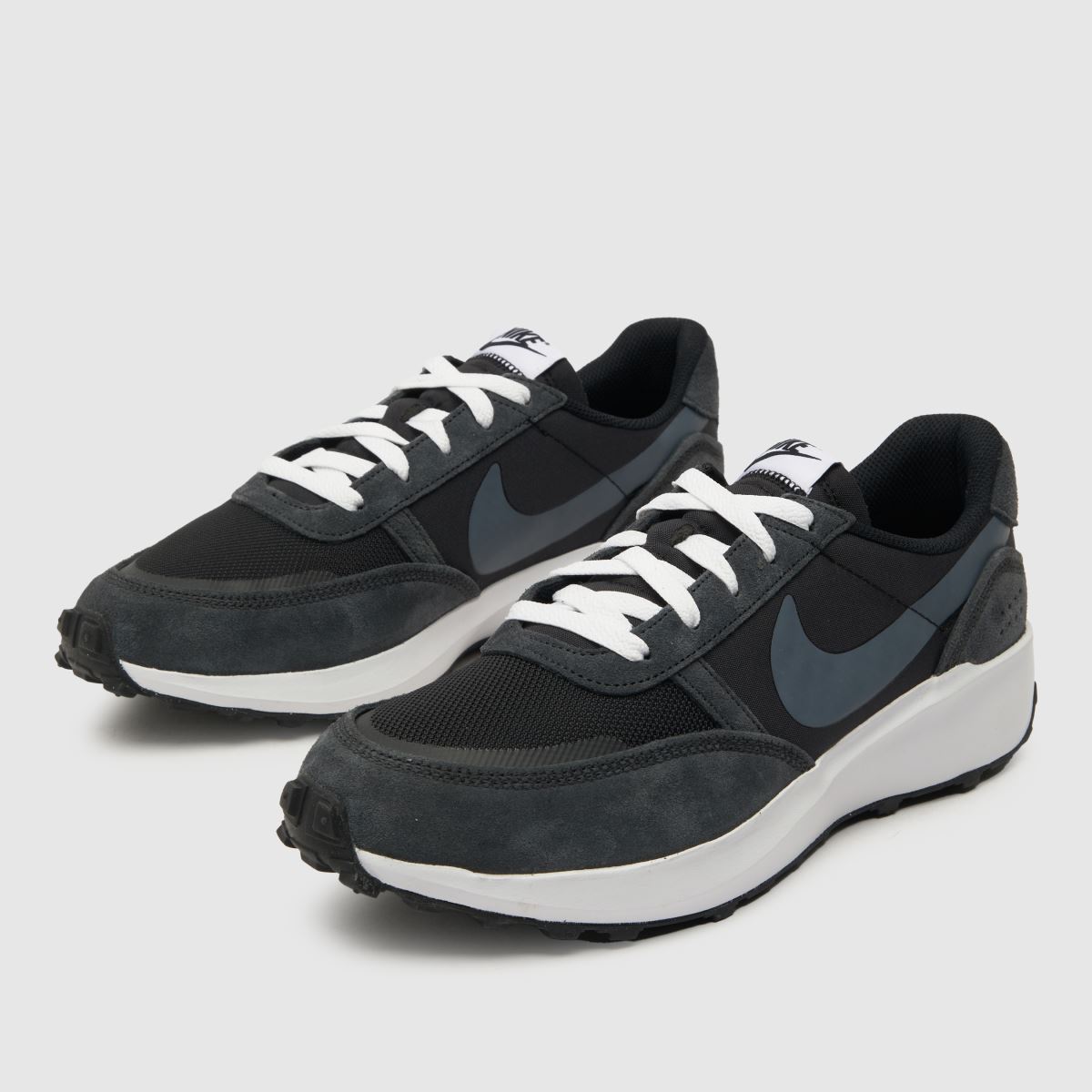 Nike – Svarta och vita våffeldebutsneakers