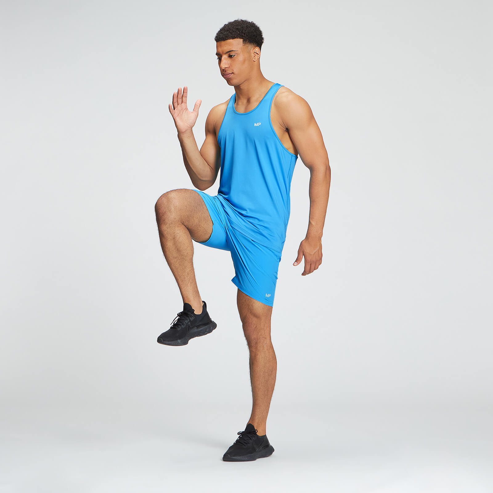 Short d’entraînement en matière tissée MP pour hommes – Bleu vif