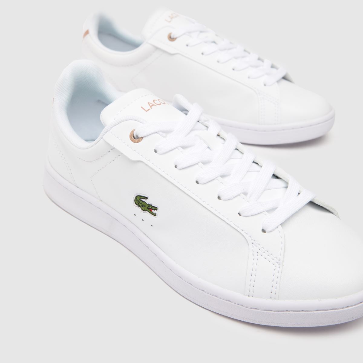 Lacoste Carnaby Pro-sneakers i vitt och rosa