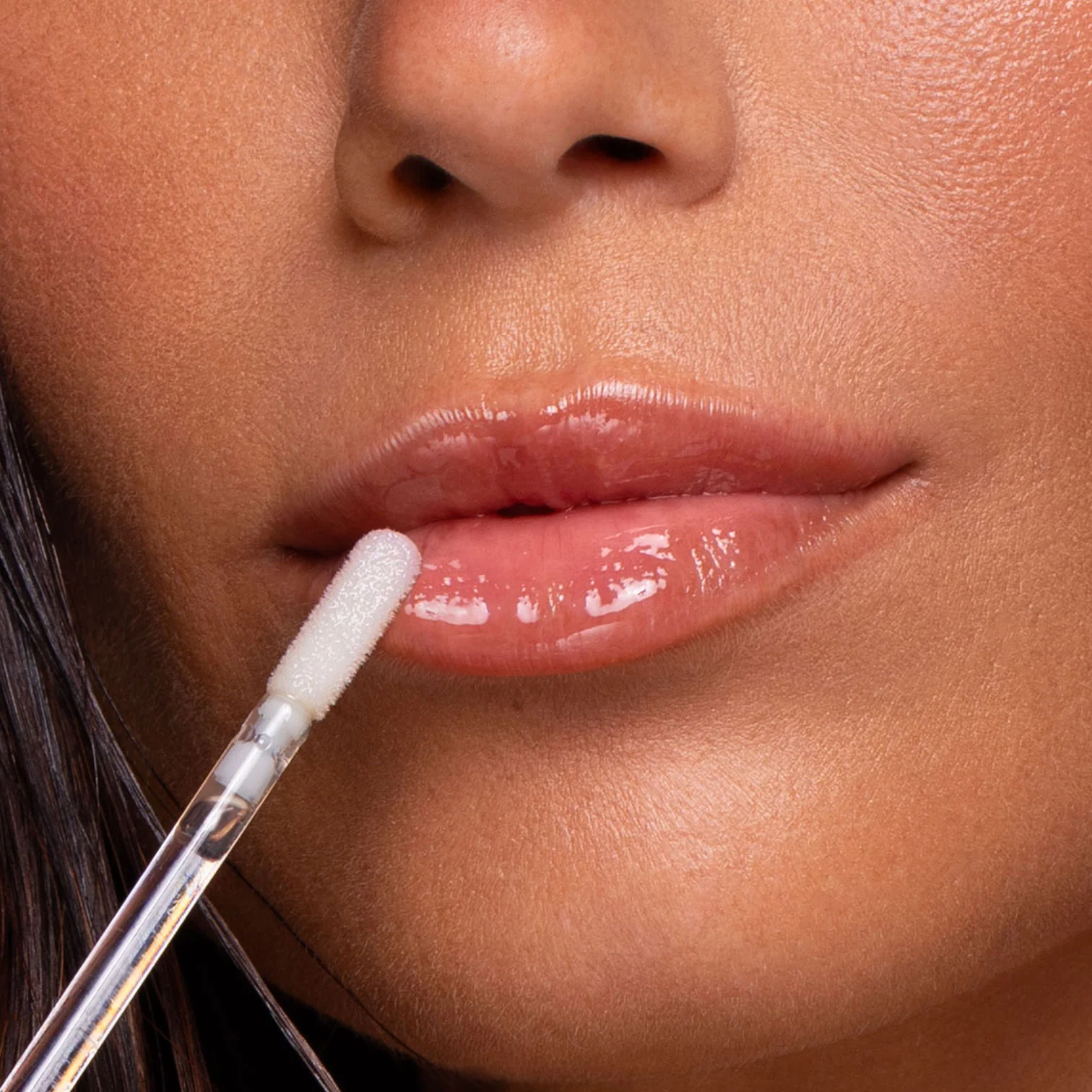 Tratamiento de aceite labial con brillo