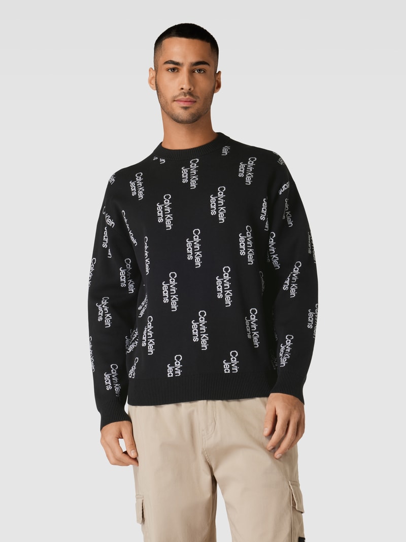 Strickpullover mit Allover-Label-Schriftzügen in black