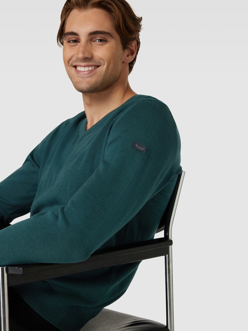 Strickpullover mit Label-Patch in dunkelgrün