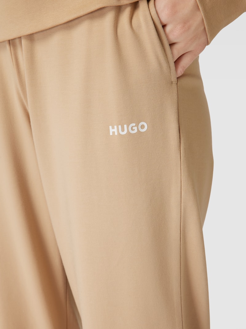 Sweatpants mit Label-Stitching in beige