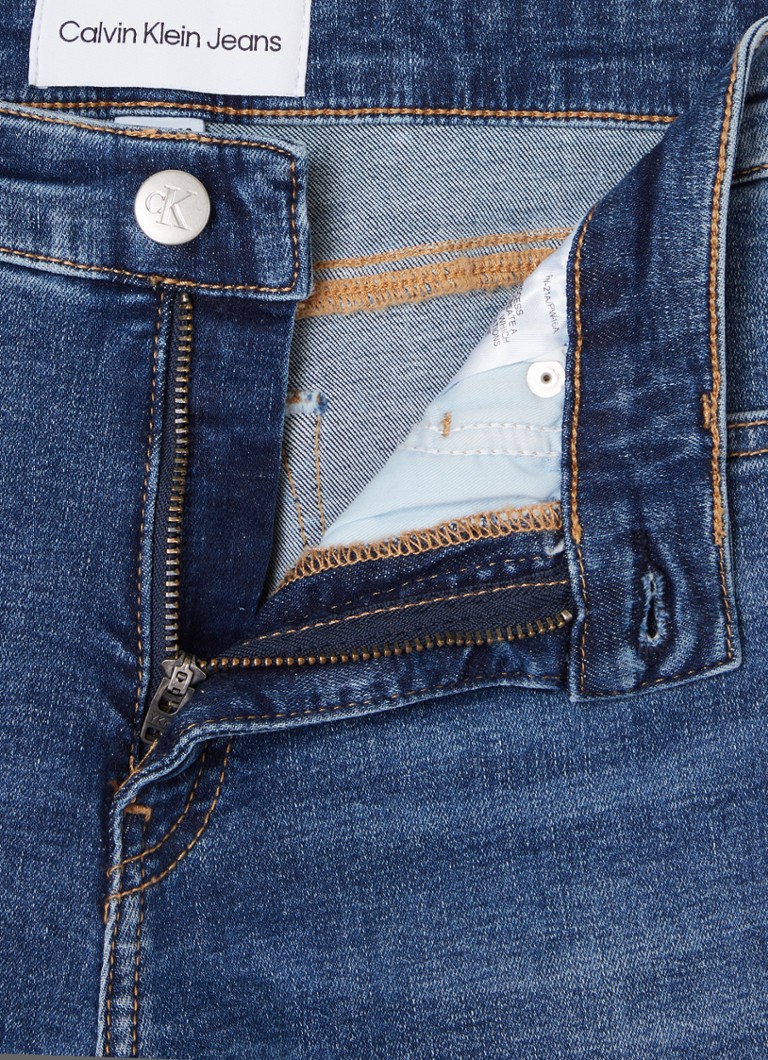 Jeans skinny a vita media Calvin Klein, lavaggio medio