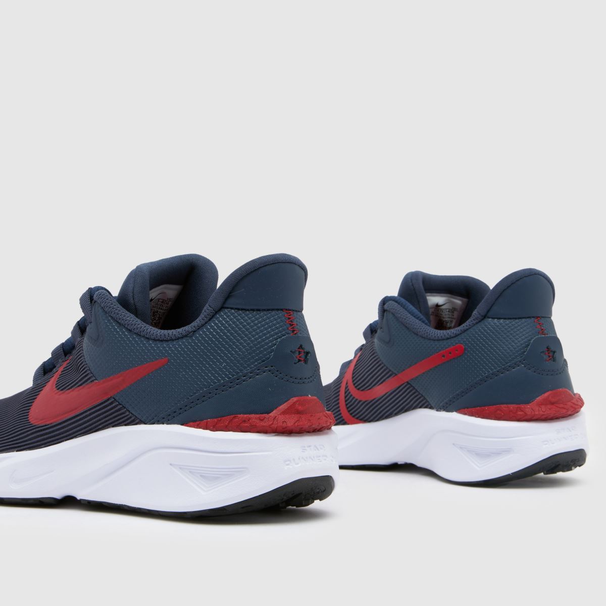 Nike marinblå Star Runner 4 pojkar/ungdomsskor