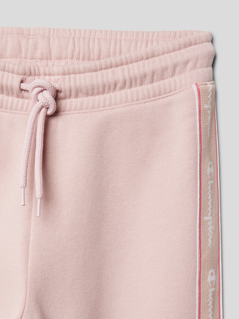 Sweatpants mit Galonstreifen in hellrosa