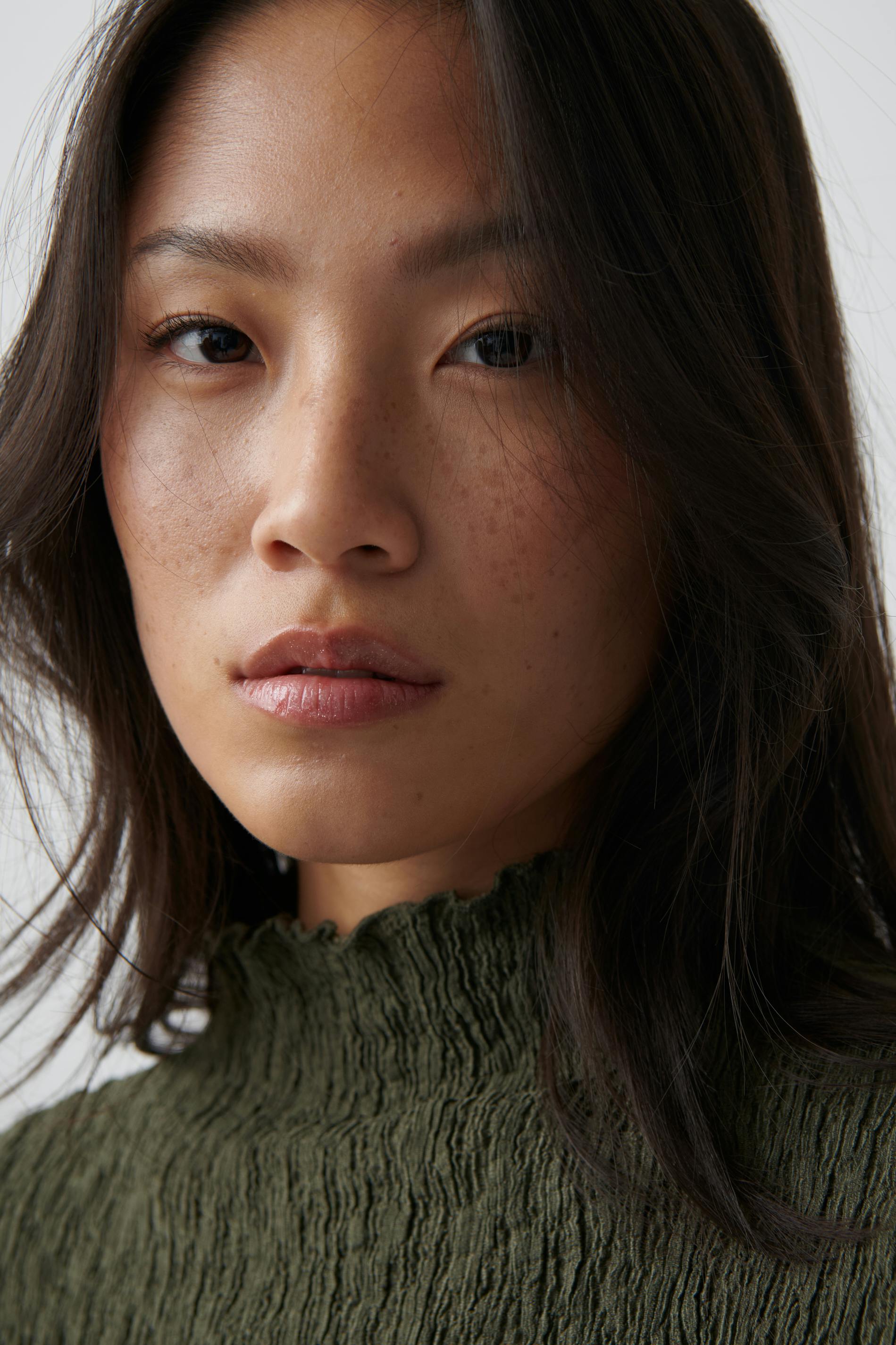 Textured funnel neck top