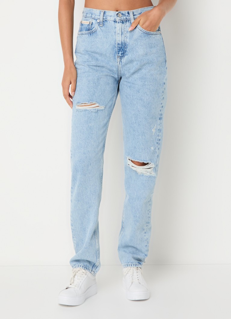 Calvin Klein high-waist slim-fit jeans with a light wash and destroyed finish
