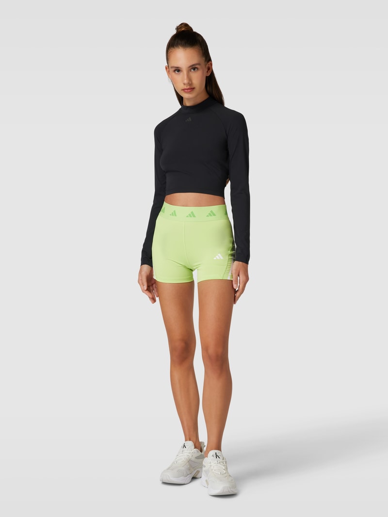 Shorts mit Label-Stitching in neon grün