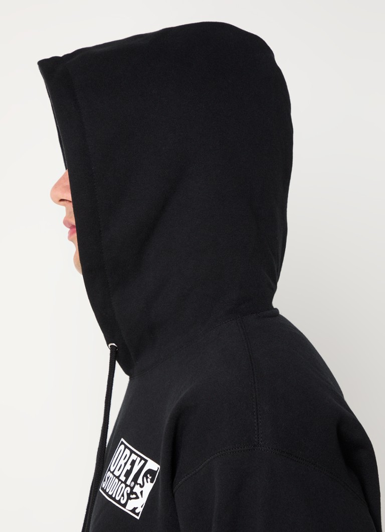 Moletom Obey Studios Icon com logo e estampa nas costas