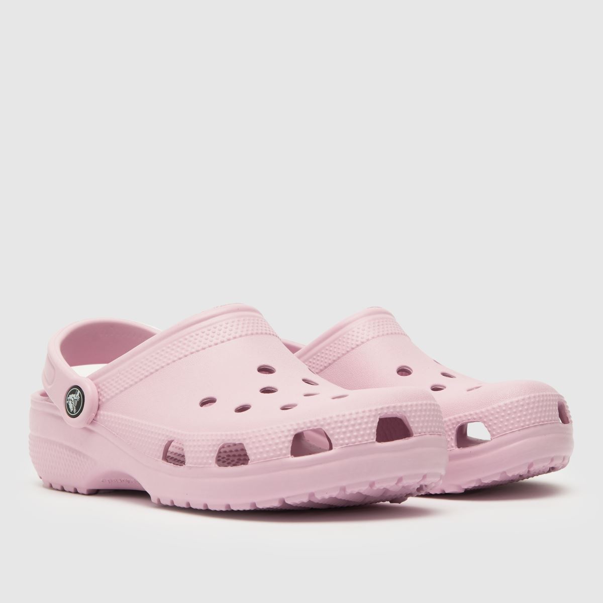 Crocs ljusrosa klassiska träskor för flickor och ungdomar