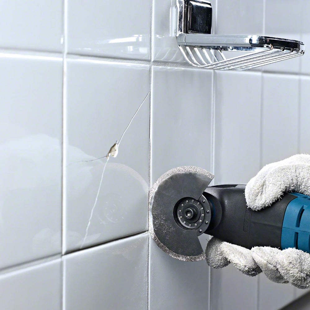 Disco diamantado segmentado BOSCH de 85 mm para ferramentas multifuncionais, ideal para argamassas e materiais abrasivos.