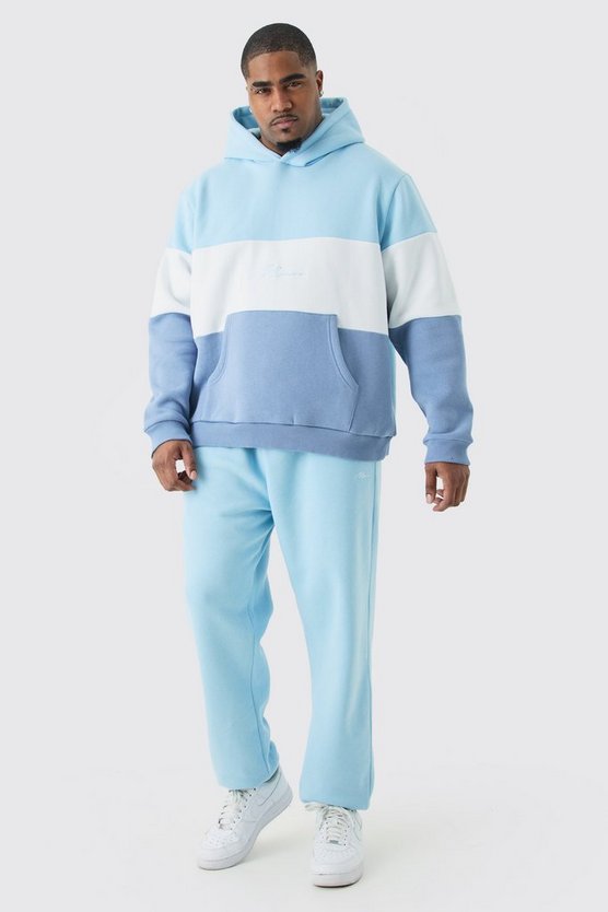 Plus hellblauer Colorblock Man Trainingsanzug mit Kapuze
