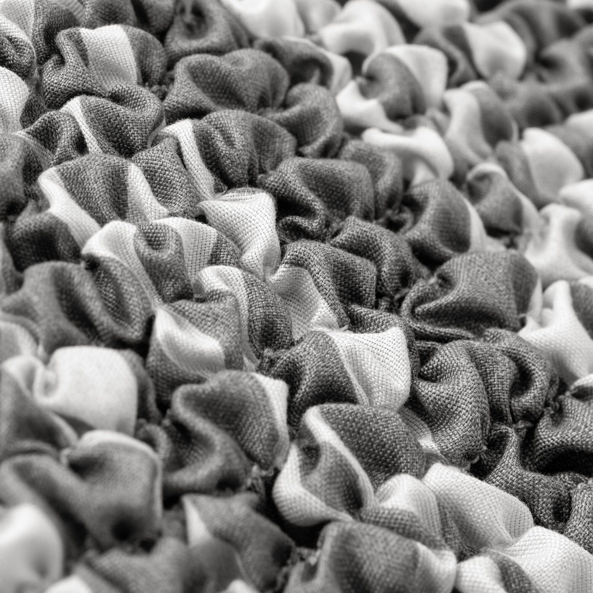 Housse bi-extensible microfibre imprimé vagues pour fauteuil et canapé