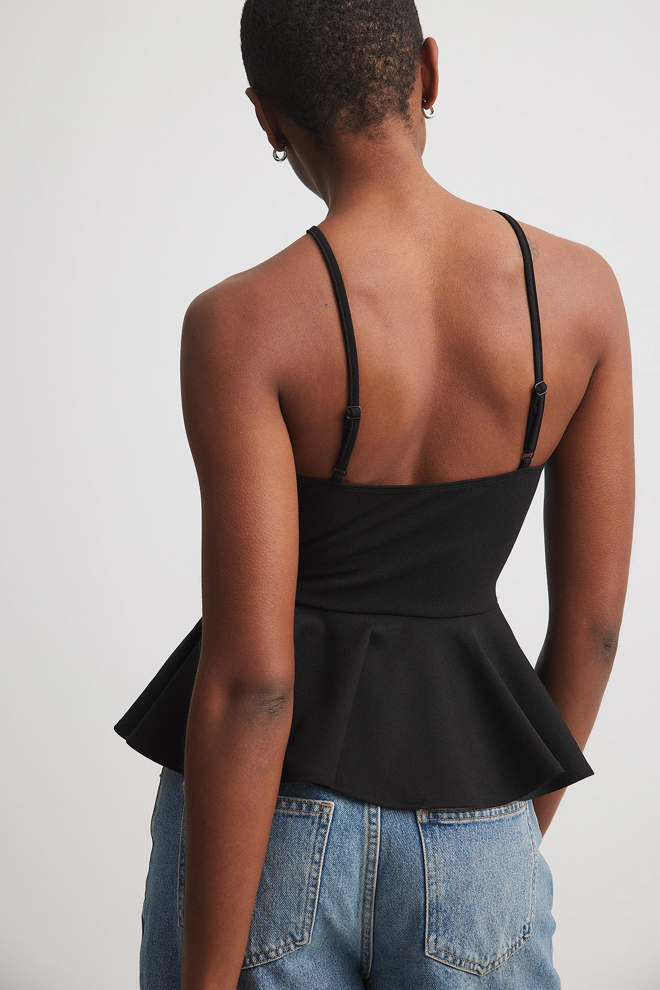 Peplum-Oberteil mit Neckholder-Ausschnitt