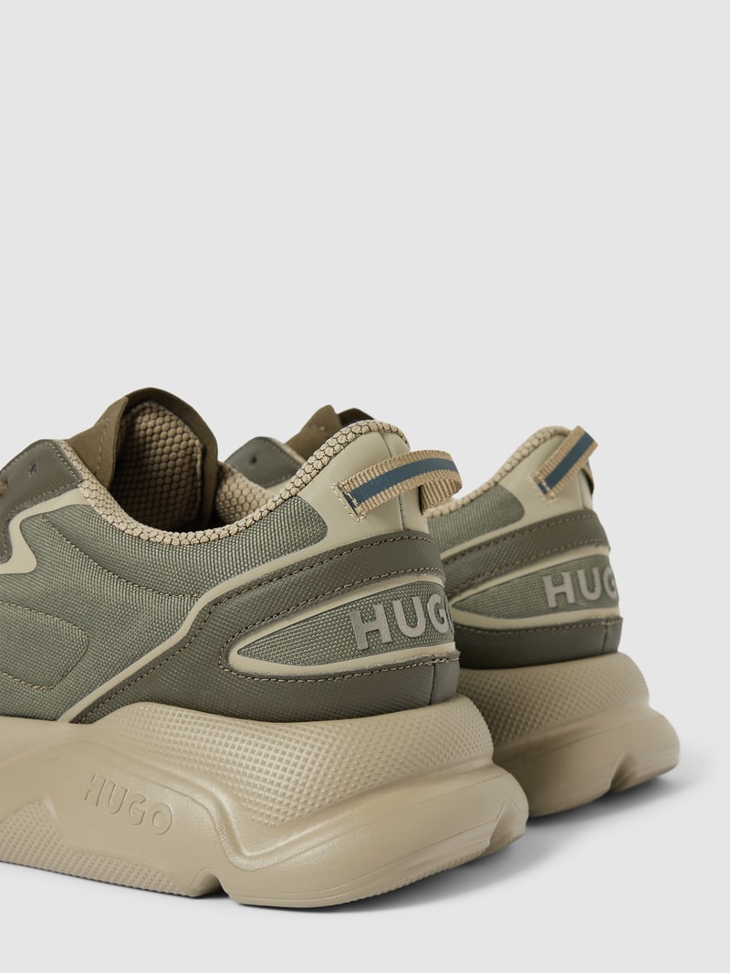 Sneaker mit Label-Patch Modell 'Leon' in olivgrün