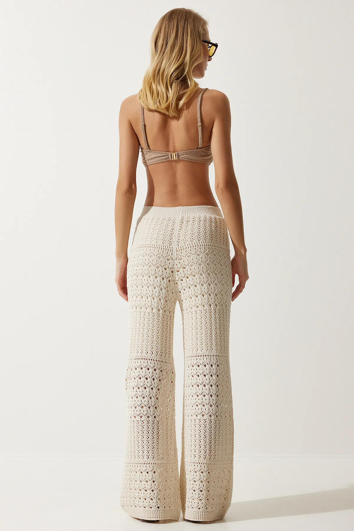 Happiness İstanbul  Cremefarbene, geschwungene Strickhose für Damen YU00016
