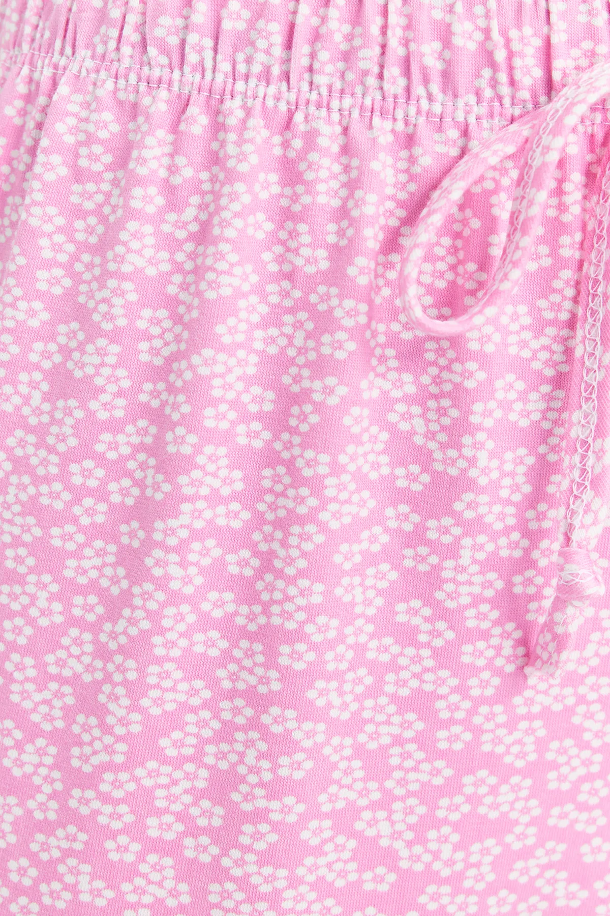 Trendyol Collection  Gestrickte Pyjamahose aus rosafarbener Baumwolle mit Blumenmuster THMSS23PJ00005