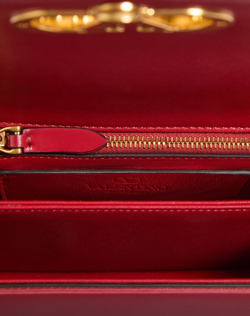 Bolsa de ombro pequena Valentino Garavani Vain em couro de bezerro brilhante